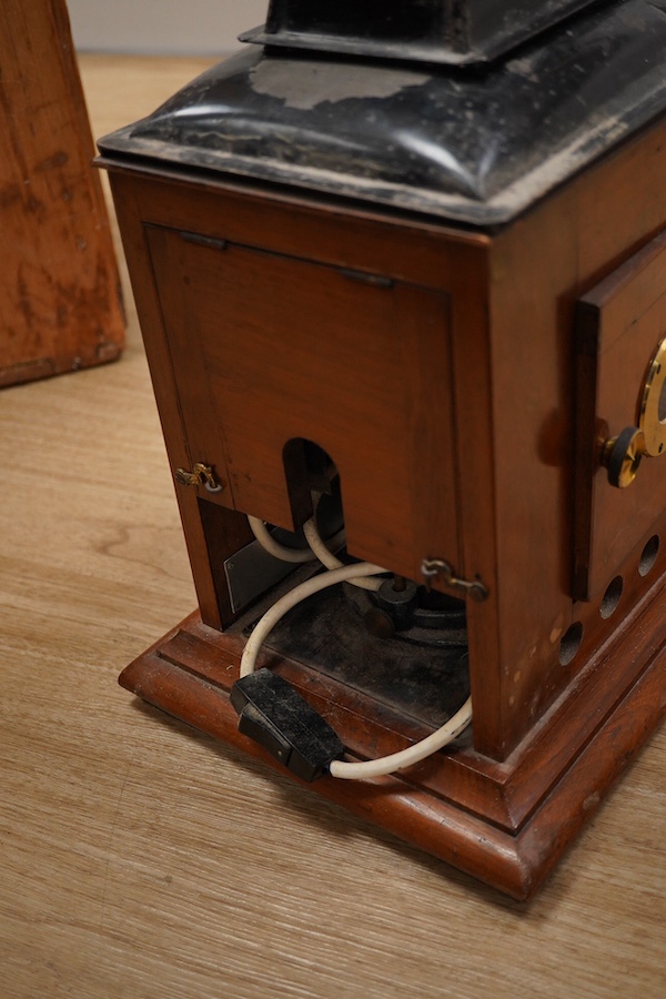 A mahogany and brass magic lantern in pine box, and a quantity of magic lantern slides by Primus, etc. Condition - poor to fair.